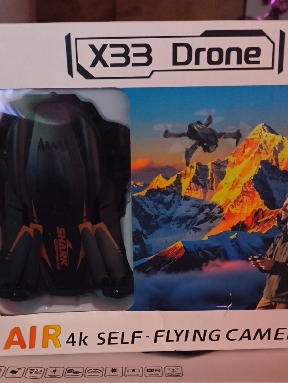 X33 Drone AIR 4K Self-Flying Camera - Black with Orange Accents